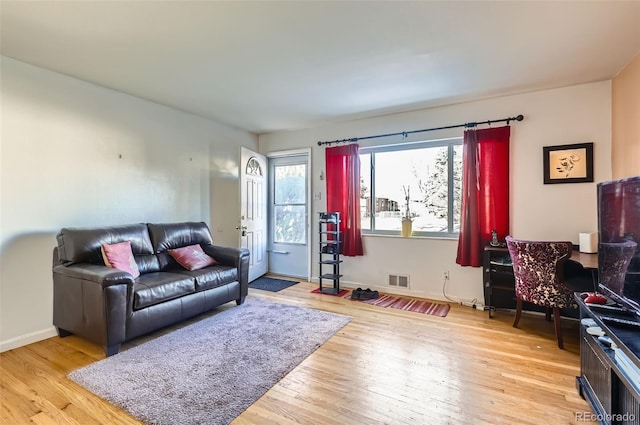 living room featuring light hardwood / wood-style floors