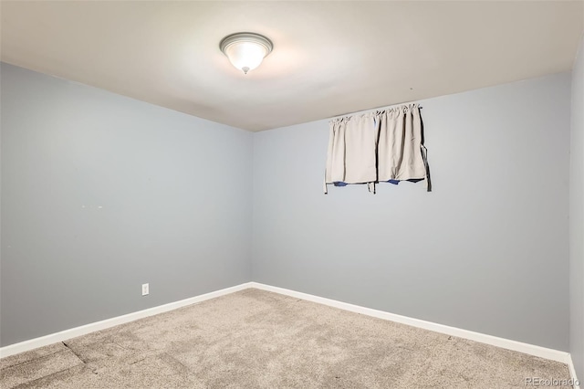 unfurnished room with carpet