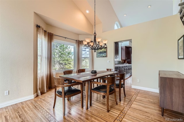 19770 E Geddes Pl, Centennial, CO 80016 - dining room with a chandelier, light wood-style flooring, baseboards, vaulted ceiling, and recessed lighting