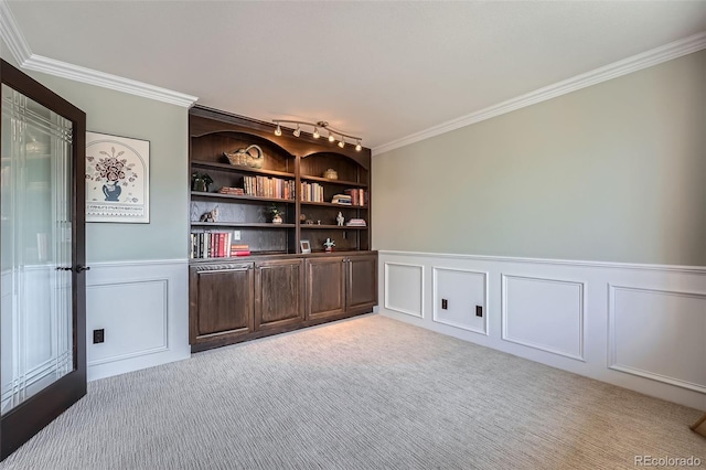 19770 E Geddes Pl, Centennial, CO 80016 - unfurnished office featuring a decorative wall, crown molding, a wainscoted wall, light colored carpet, and track lighting