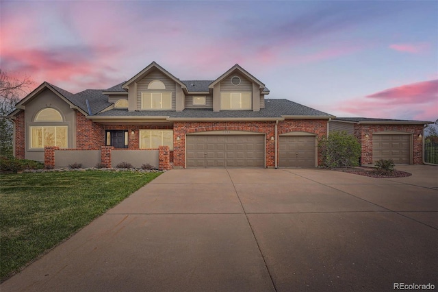 19770 E Geddes Pl, Centennial, CO 80016 - view of front of property featuring driveway, a yard, brick siding, and roof with shingles