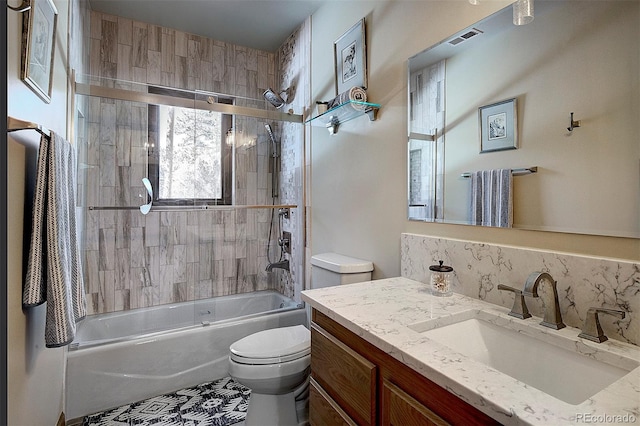 full bath featuring vanity, shower / bathing tub combination, toilet, and visible vents