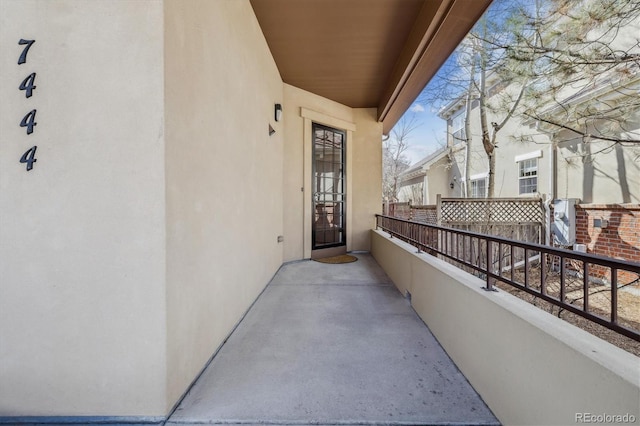 view of exterior entry with stucco siding