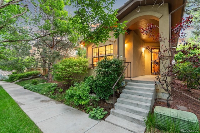 7444 E 9th Ave, Denver, CO 80230 - view of exterior entry with stucco siding