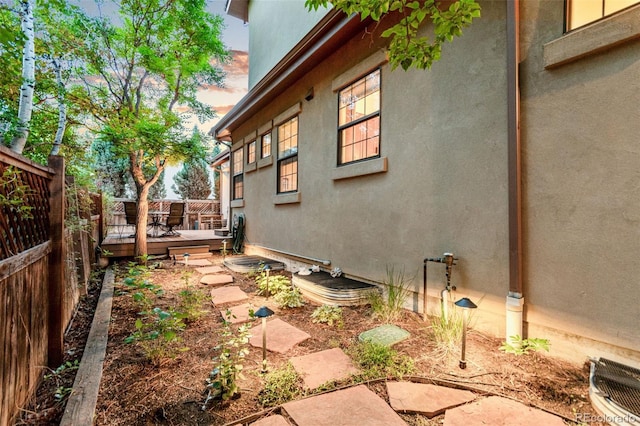 7444 E 9th Ave, Denver, CO 80230 - fenced backyard with a wooden deck