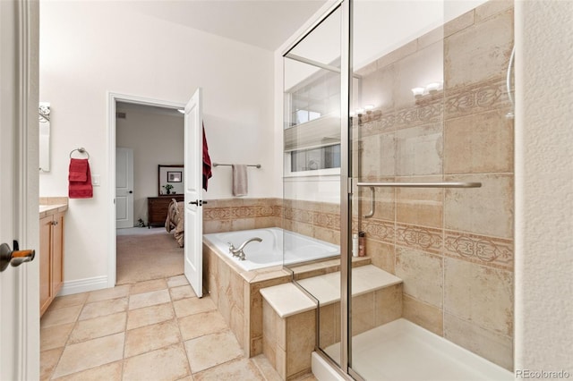 7444 E 9th Ave, Denver, CO 80230 - bathroom featuring a bath, vanity, a stall shower, and connected bathroom