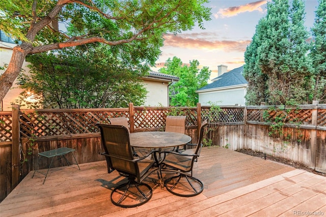7444 E 9th Ave, Denver, CO 80230 - wooden terrace with outdoor dining area