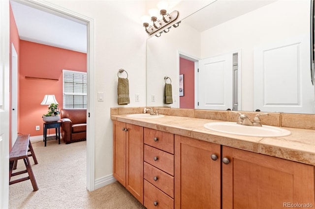 7444 E 9th Ave, Denver, CO 80230 - bathroom featuring double vanity and baseboards