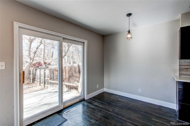 interior space with dark wood-type flooring