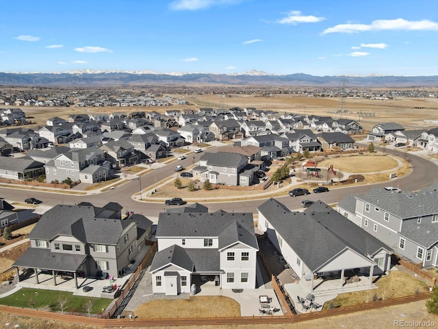 bird's eye view with a residential view and a mountain view