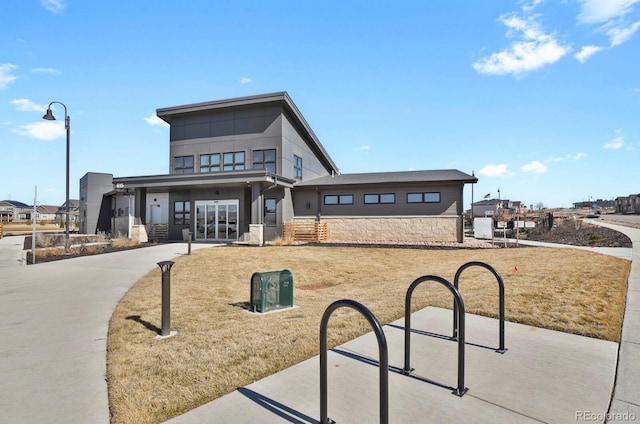 exterior space with concrete driveway