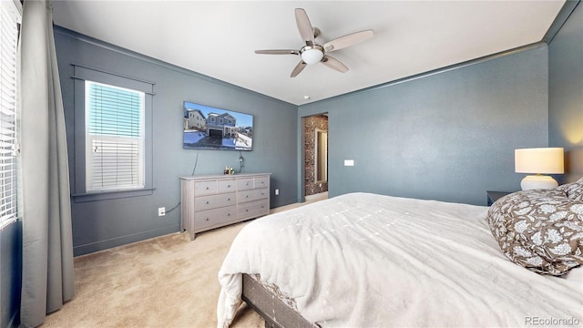 bedroom featuring light carpet and ceiling fan