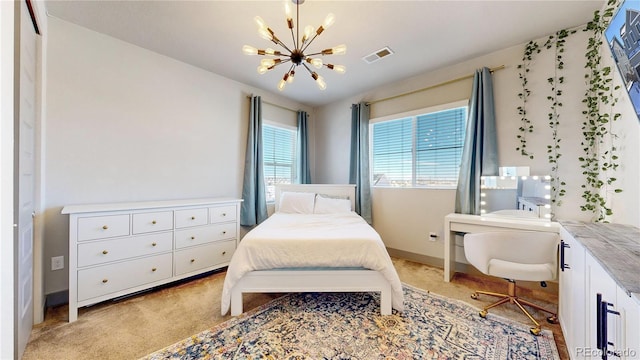 bedroom with baseboards, visible vents, light colored carpet, vaulted ceiling, and a chandelier