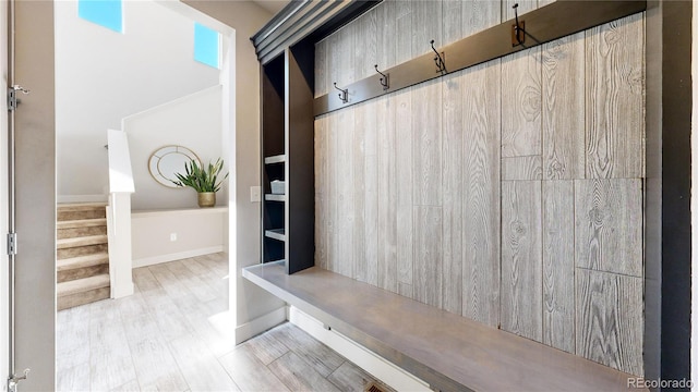 mudroom featuring baseboards