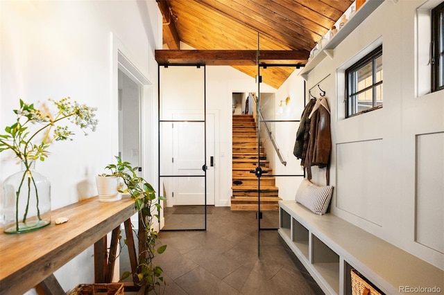 534 W Meadow Rd, Evergreen, CO 80439 - mudroom featuring wood ceiling and dark tile patterned floors