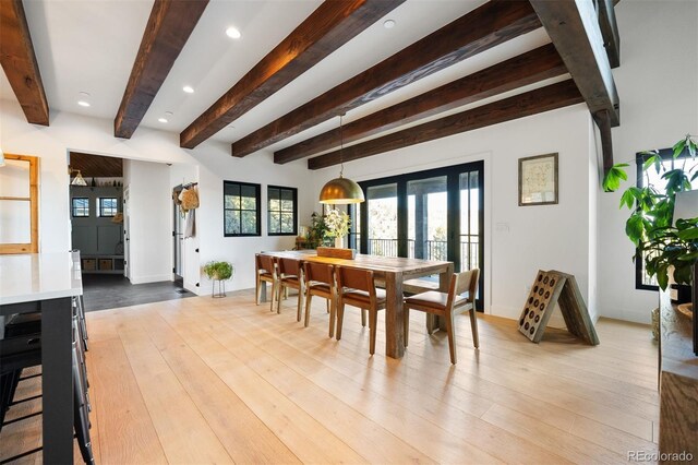 534 W Meadow Rd, Evergreen, CO 80439 - dining space featuring beamed ceiling, plenty of natural light, recessed lighting, and wood finished floors