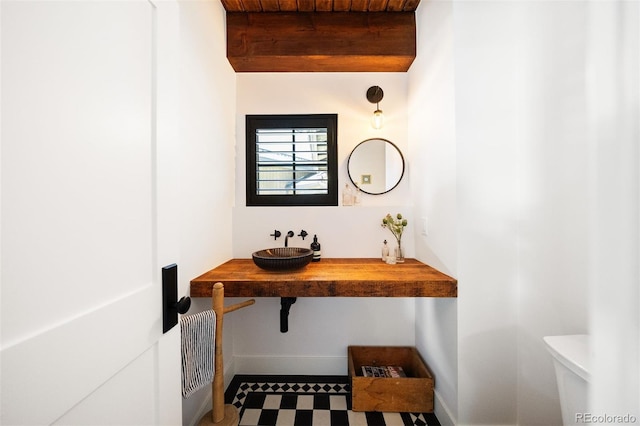 534 W Meadow Rd, Evergreen, CO 80439 - detailed view of baseboards and tile patterned floors