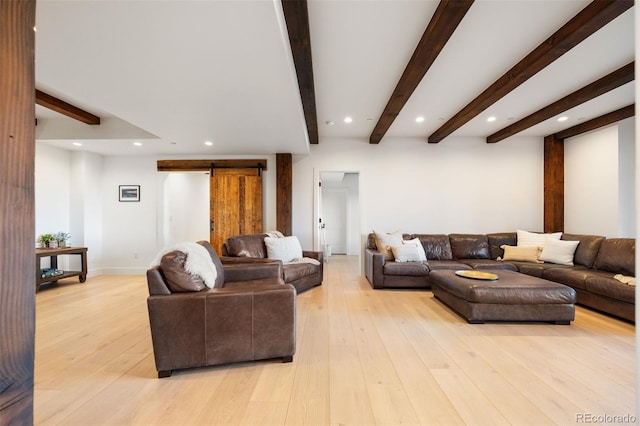 534 W Meadow Rd, Evergreen, CO 80439 - living room with beamed ceiling, recessed lighting, a barn door, and light wood-type flooring