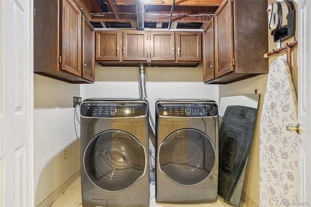 215 Sunland St, Louisville, CO 80027 - laundry area with cabinet space and independent washer and dryer