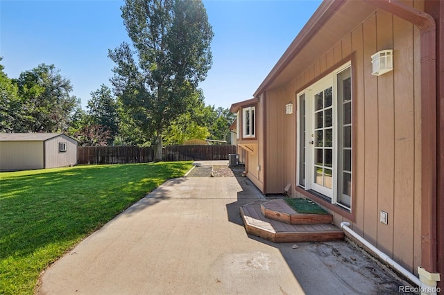215 Sunland St, Louisville, CO 80027 - fenced backyard with a patio area and a shed