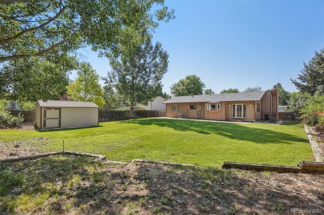 215 Sunland St, Louisville, CO 80027 - fenced backyard with a storage unit