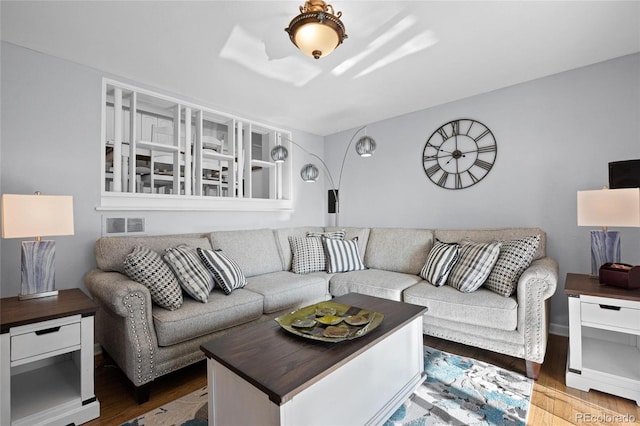 living room with dark hardwood / wood-style floors