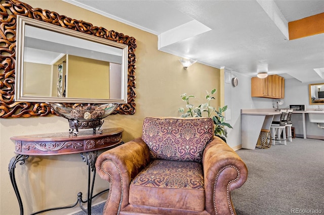 living area featuring light carpet and crown molding