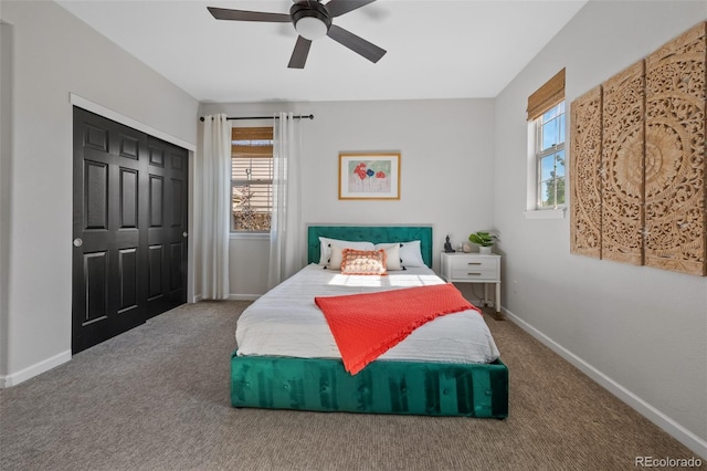 bedroom with a closet, carpet floors, and ceiling fan