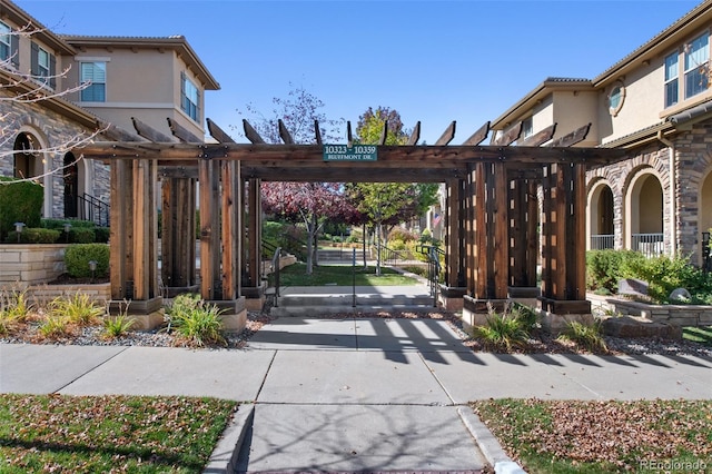 view of gate with a pergola