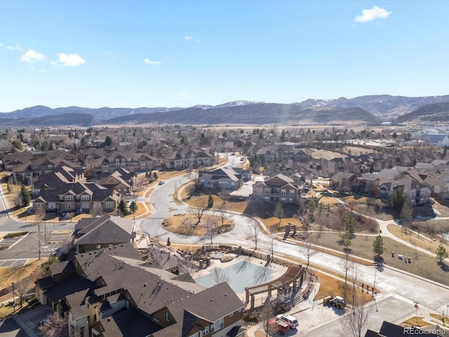 birds eye view of property with a residential view and a mountain view