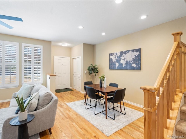 dining area with recessed lighting, stairway, light wood-style flooring, and baseboards