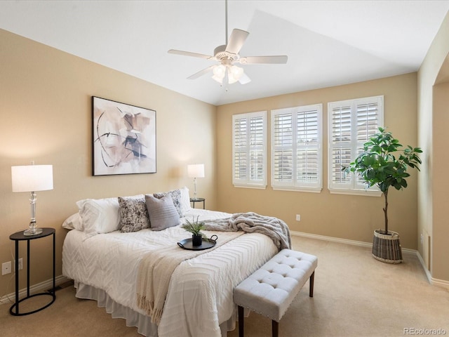 bedroom featuring carpet, baseboards, and ceiling fan