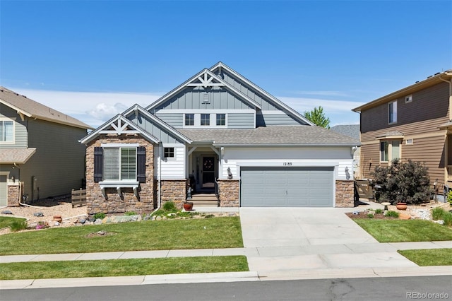12189 Windy Trail Ln, Parker, CO 80138 - craftsman inspired home featuring board and batten siding, stone siding, an attached garage, a front lawn, and concrete driveway