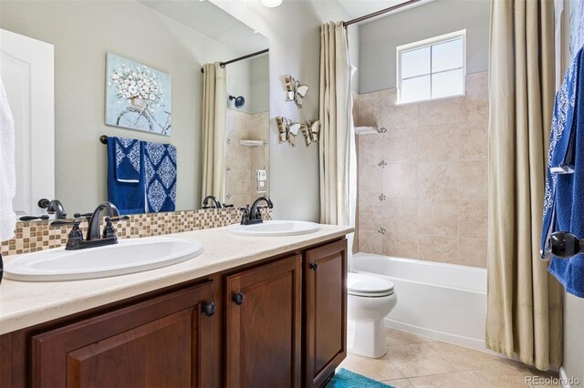 12189 Windy Trail Ln, Parker, CO 80138 - bathroom with shower / bath combination with curtain, double vanity, tile patterned floors, and toilet