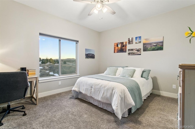 carpeted bedroom featuring a ceiling fan and baseboards