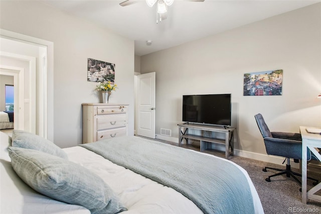 carpeted bedroom featuring visible vents, baseboards, and a ceiling fan