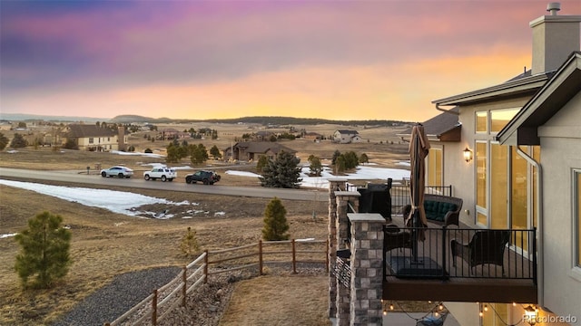 view of yard at dusk