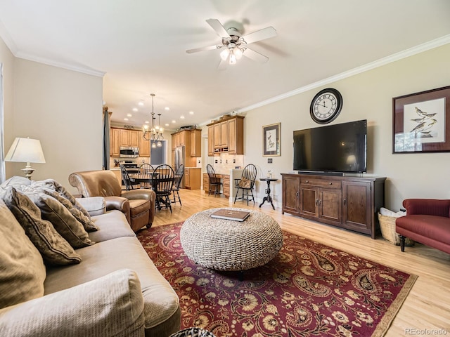 9625 S Hackberry St, Highlands Ranch, CO 80129 - living room with light wood finished floors, ceiling fan, a chandelier, and crown molding