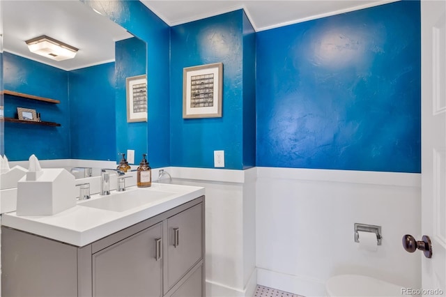 bathroom featuring toilet and vanity