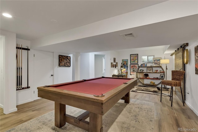 game room with baseboards, light wood-type flooring, a barn door, recessed lighting, and billiards