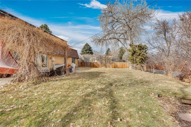 view of yard with fence