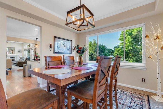 6266 Holman St, Arvada, CO 80004 - dining area with crown molding and baseboards