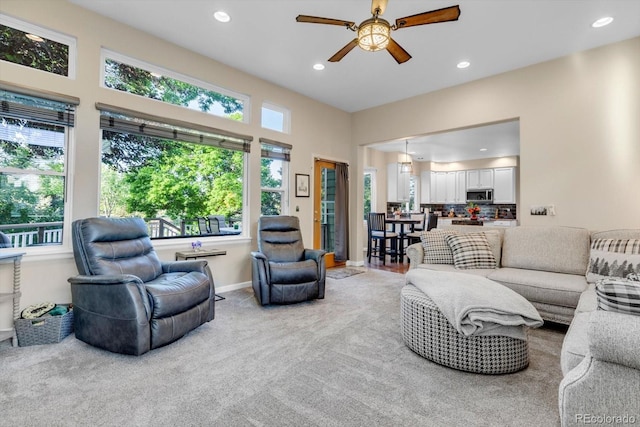 6266 Holman St, Arvada, CO 80004 - living room with a ceiling fan, recessed lighting, light carpet, and baseboards