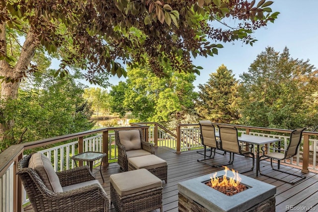 6266 Holman St, Arvada, CO 80004 - wooden terrace with a fire pit