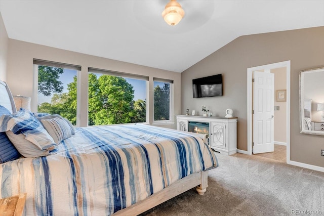 6266 Holman St, Arvada, CO 80004 - bedroom featuring lofted ceiling, light carpet, and baseboards
