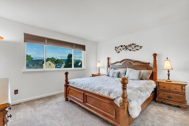 6266 Holman St, Arvada, CO 80004 - bedroom featuring light carpet and baseboards