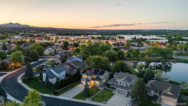 6266 Holman St, Arvada, CO 80004 - aerial view at dusk of a residential view and a water view