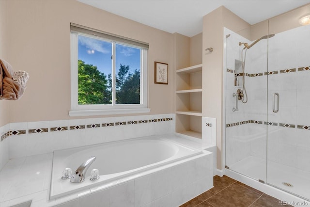 6266 Holman St, Arvada, CO 80004 - full bath featuring a stall shower, a garden tub, and tile patterned flooring