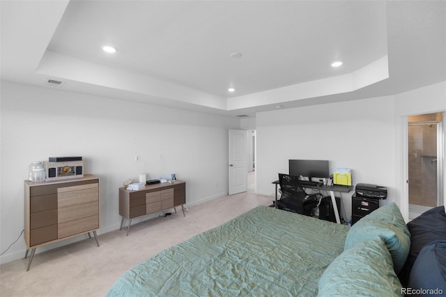 bedroom with recessed lighting, visible vents, a raised ceiling, and baseboards