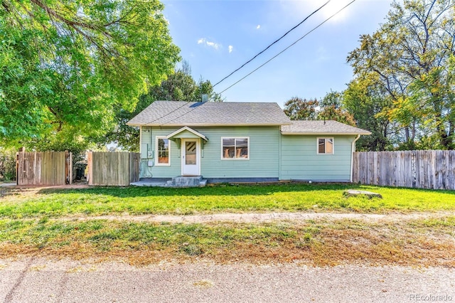 bungalow with a front yard